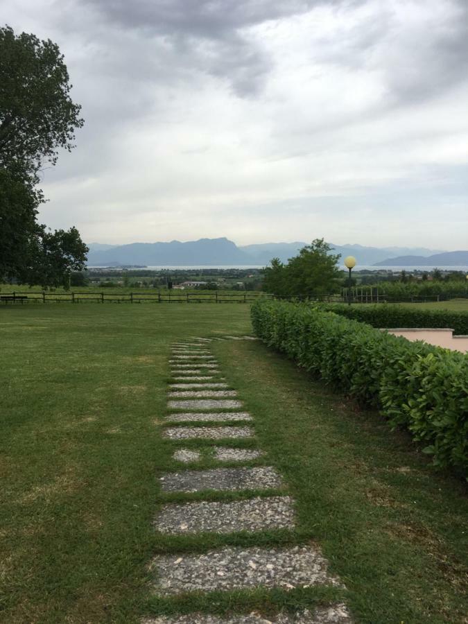 Casa Laura Garda Lago ปอสโซเลงโก ภายนอก รูปภาพ